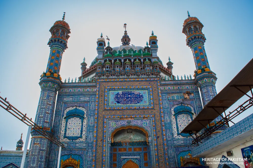Full tiled facade of the Shrine of Sachal Sarmast with twin minarets