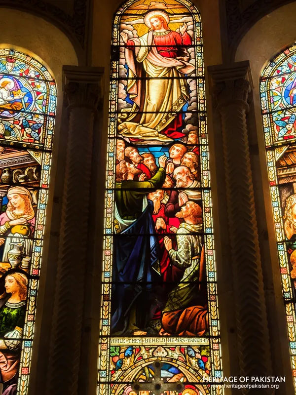 Detail of the central Ascension panel in the stained-glass triptych at Holy Trinity Church