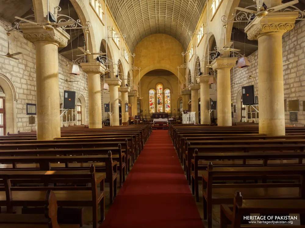 Nave of Holy Trinity Church looking toward the stained-glass altar window