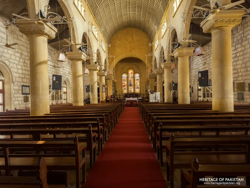 Nave of Holy Trinity Church looking toward the stained-glass altar window
