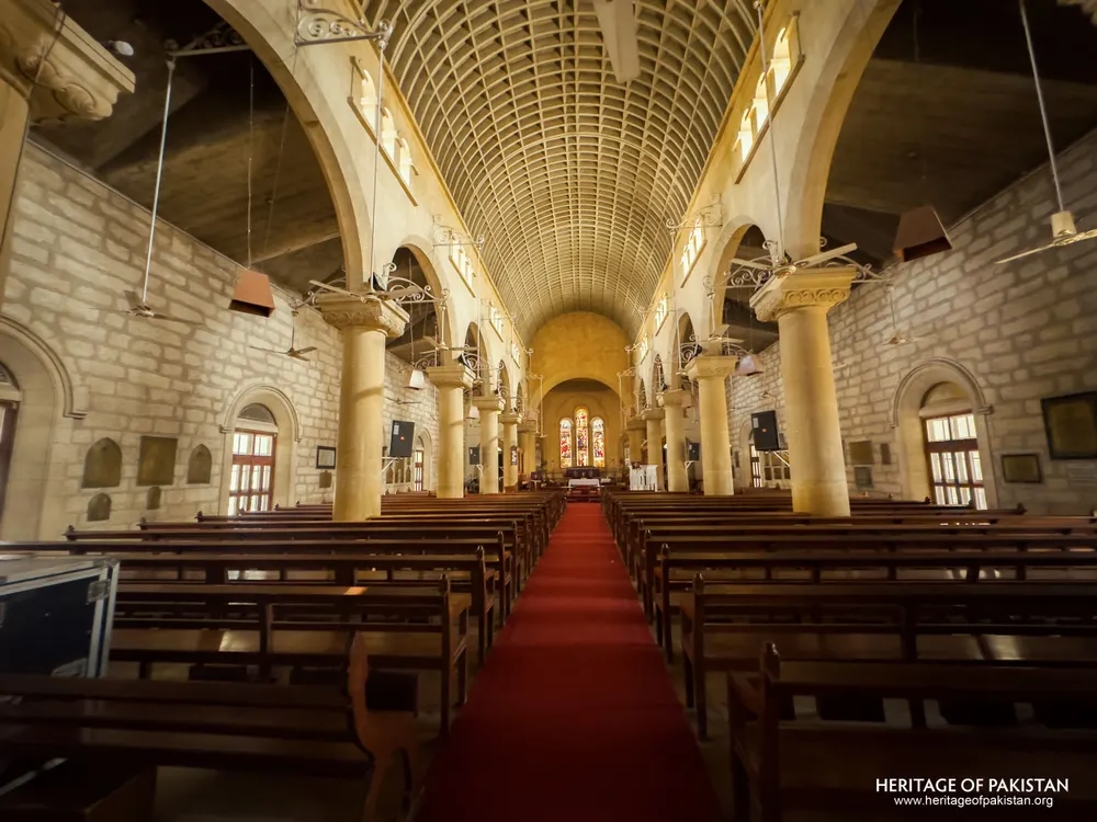 Elevated view of Holy Trinity Church's nave with sandstone arcades and vaulted ceiling