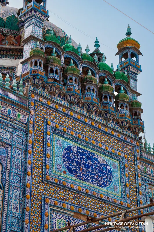 Kashi-tiled facade of the Shrine of Sachal Sarmast with a blue calligraphic cartouche