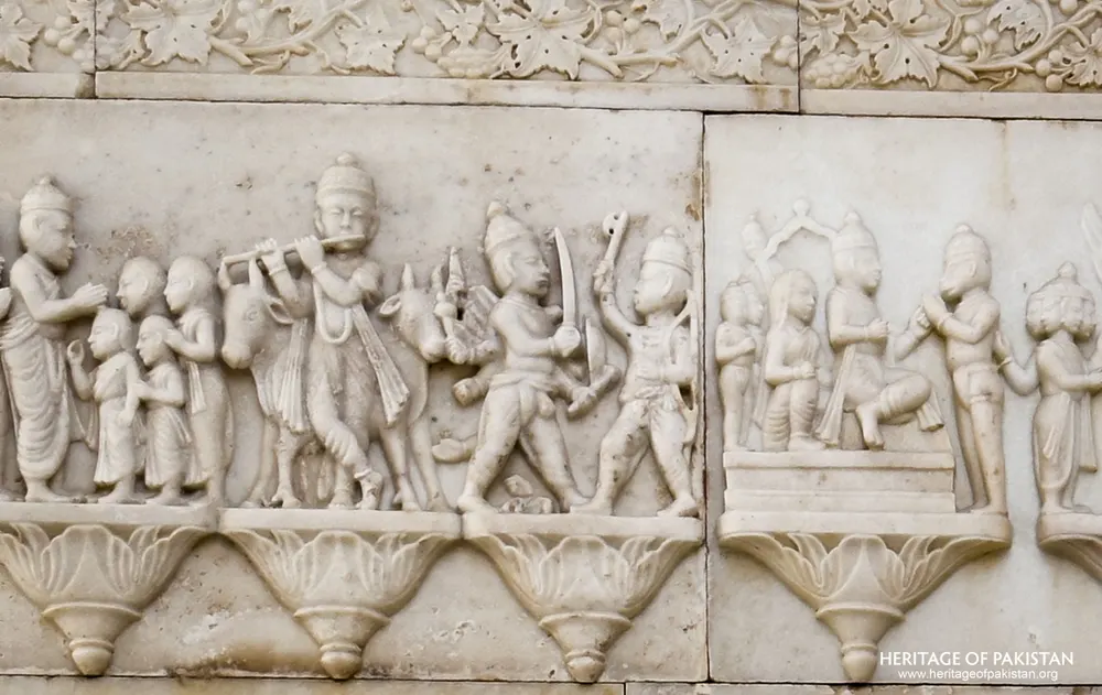 Relief carving of a flute-playing figure with cattle and warriors, Krishna-themed frieze panel at Sadhu Belo Temple