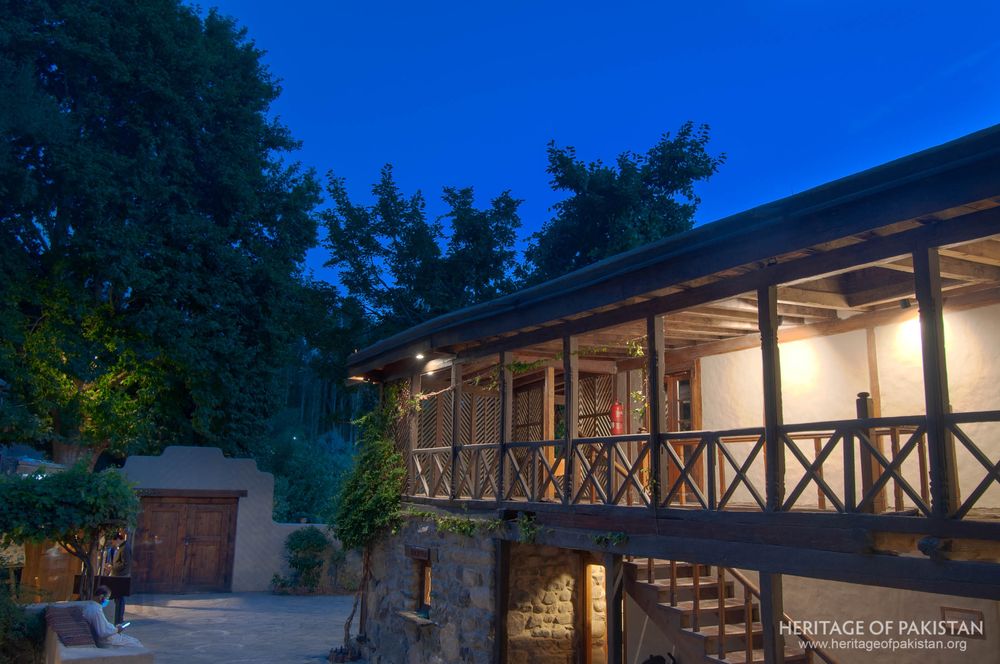 Evening lights warm the courtyard entrance at Shigar Fort.